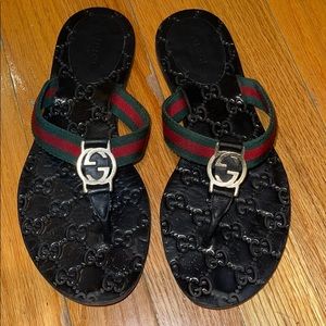 Gucci logo flip flops